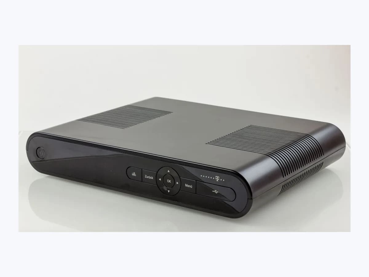 Black Deutsche Telekom Media Receiver 303 A digital TV set-top box on a plain white background