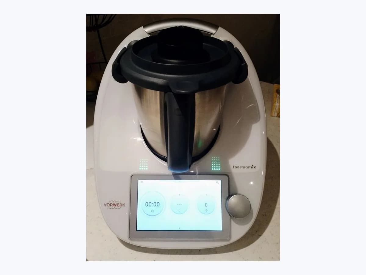 Vorwerk Thermomix TM6 kitchen robot with stainless-steel mixing bowl, fitted lid, rotary selector and illuminated touchscreen